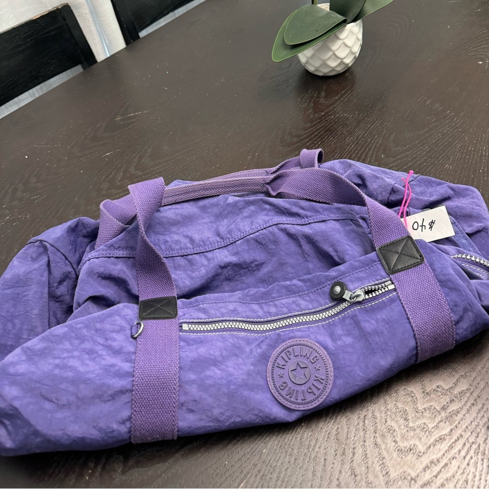 Kipling duffle bag. Small purple. $30